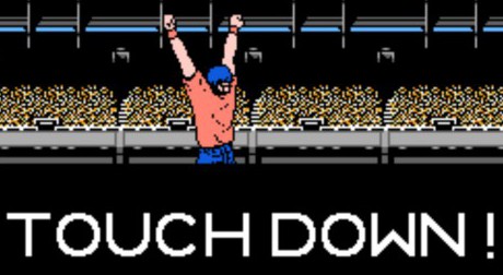Tecmo Elway Scene from NES game; Quarterback celebrates touchdown in all his 8-bit glory